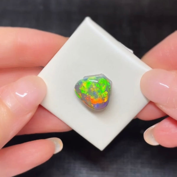 7.64ct black crystal opal 14.8x13.2x6.8MM