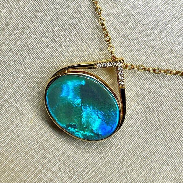 10.62ct boulder opal 18K necklace