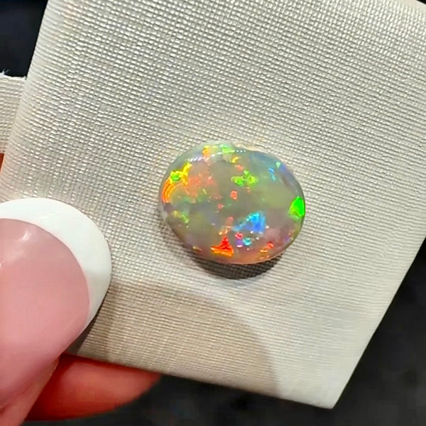 2.5ct black opal 11.4x9.2x3.8MM