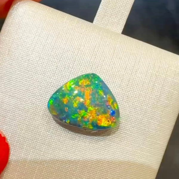 2.7ct black opal 12.9x 10x3.5MM