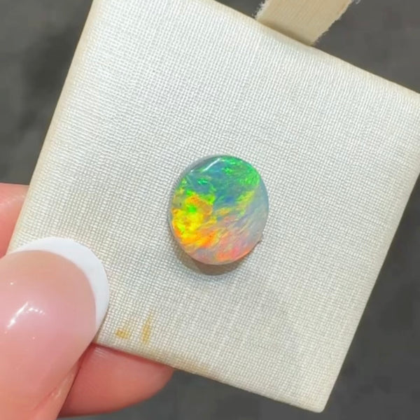 2.34ct black opal 10.6x 9.6x3.4MM