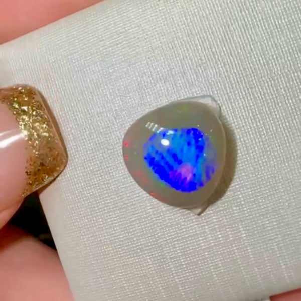 2.8ct black opal 10.6x 10.4x4.2MM