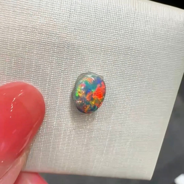 0.88ct black opal 6.9x5.4x3.4MM