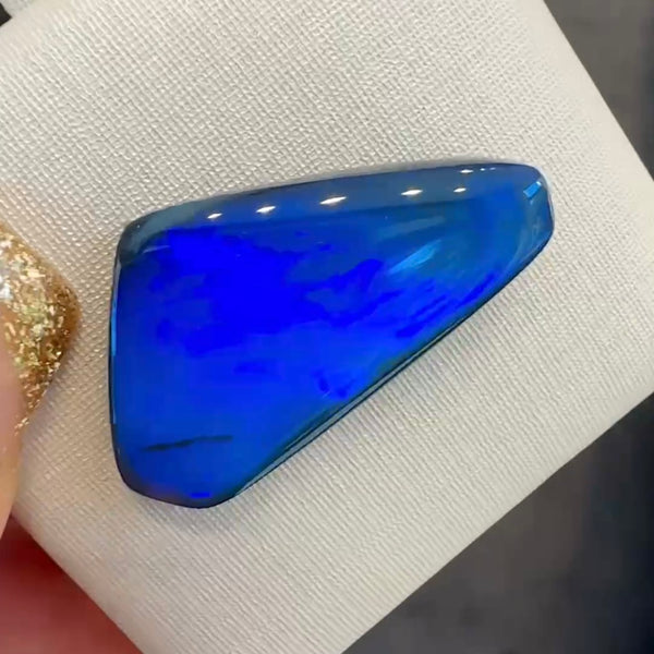 6.74ct black opal 24.4x 13.3x3.8MM